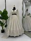 Off White Elegant Tabby Organza Semi-Stitched Lehenga Set with Digital Print & Lace Border ClothsVilla