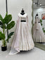 White Elegant Faux Georgette Lehenga Choli Set with Sequin Work & Designer Dupatta Clothsvilla