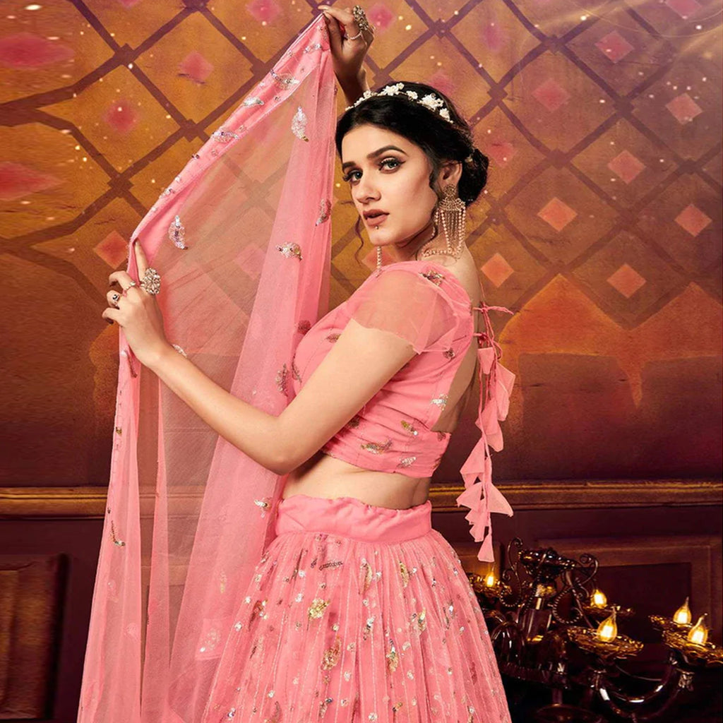 Coral Pink color Soft Net Lehenga with Heavy Sequence work and Net Dupatta ClothsVilla