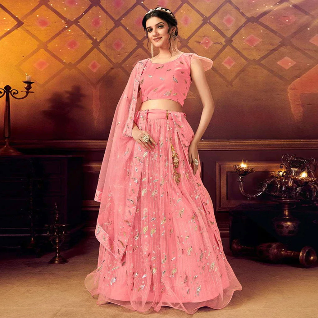 Coral Pink color Soft Net Lehenga with Heavy Sequence work and Net Dupatta ClothsVilla