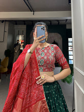 Load image into Gallery viewer, Green Color Bandhani And Ajrakh Print With Foil Work  Dola Silk Chaniya Choli Clothsvilla