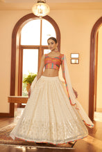Load image into Gallery viewer, Beige Embellished Mukaish Work Georgette Semi Stitched Lehenga ClothsVilla
