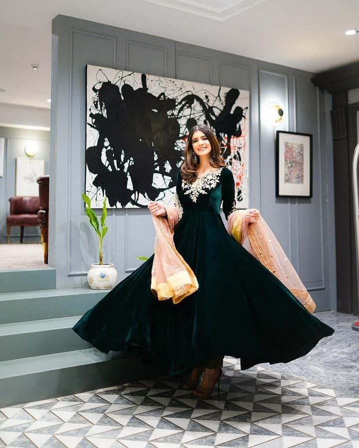 Dark Green Anarkali Gown in Velvet with Embroidery Work Dark Green Anarkali Gown in Velvet with Embroidery Work