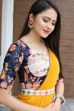 Load image into Gallery viewer, Glamourous Yellow Color Saree With Stitched Blouse Clothsvilla