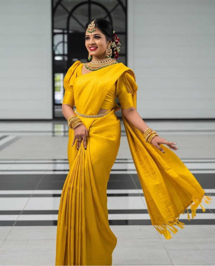 Bewitching Yellow Soft Silk Saree with Energetic Blouse Piece KPR