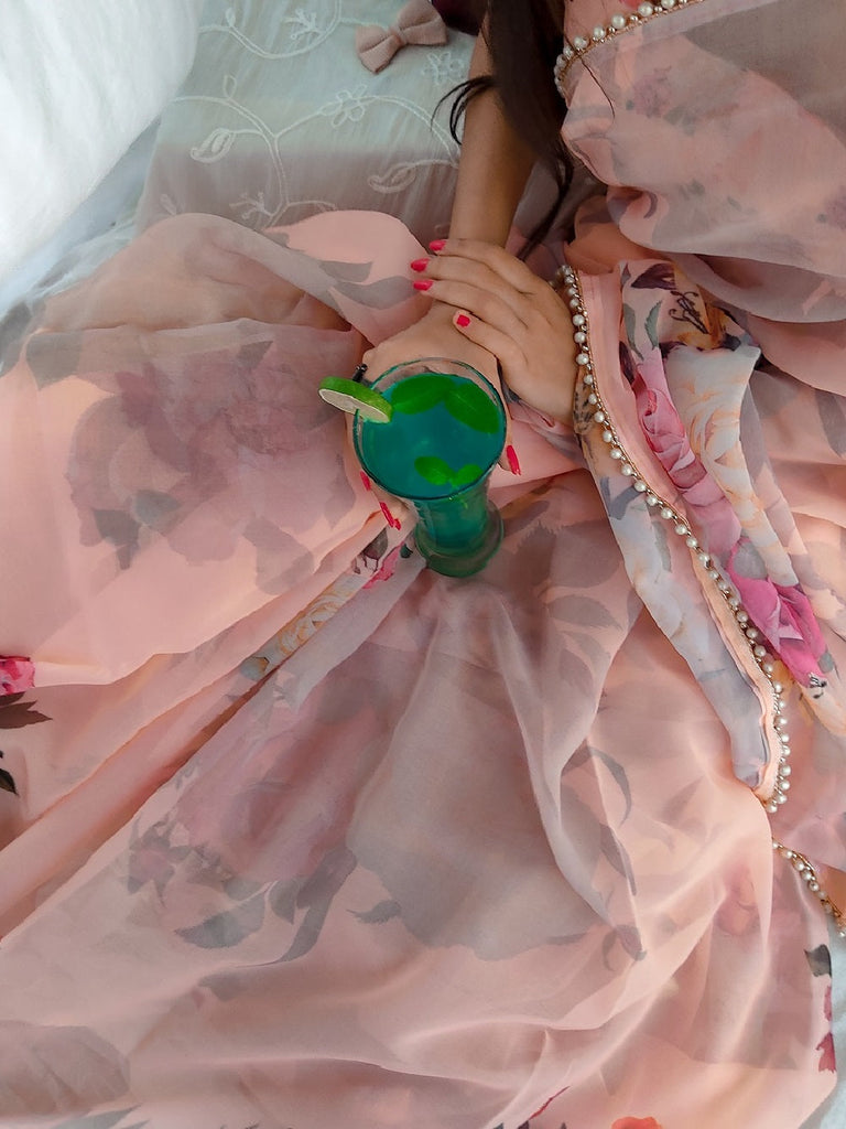 Peach Color Printed With Pearl Lace Border Georgette Saree Clothsvilla