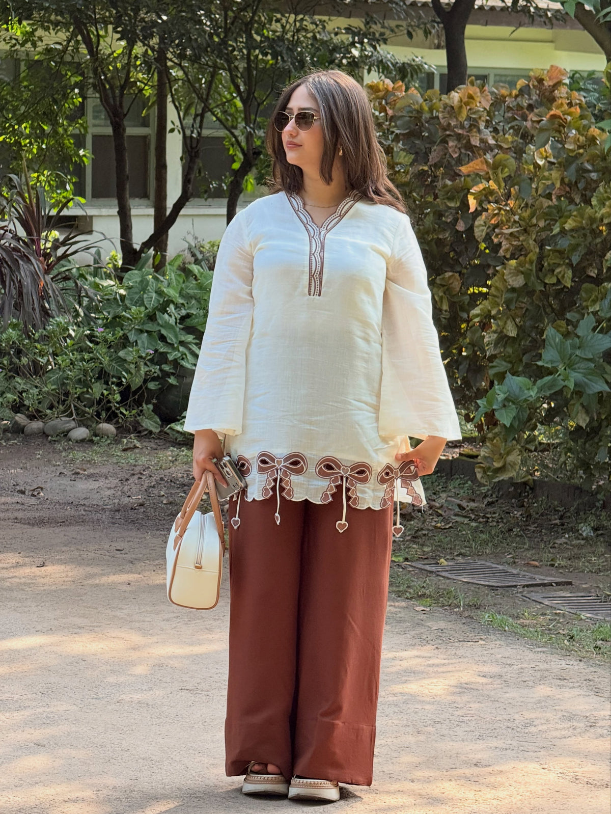 Brown Roman palazzo set illustrating wide leg, waist and kurta proportion