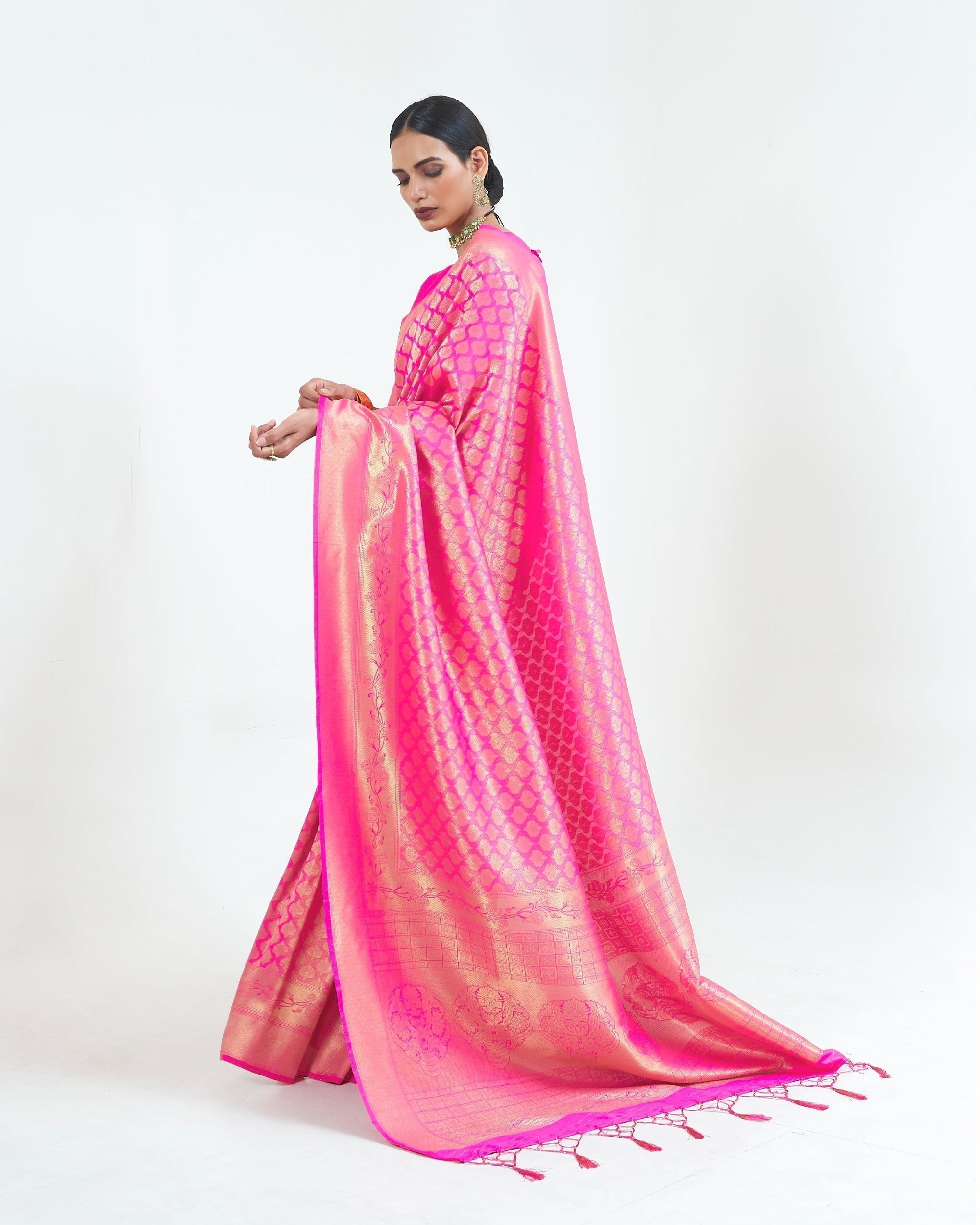 Fuchsia pink woven Kanjivaram silk saree from the ClothsVilla Kumbhi collection