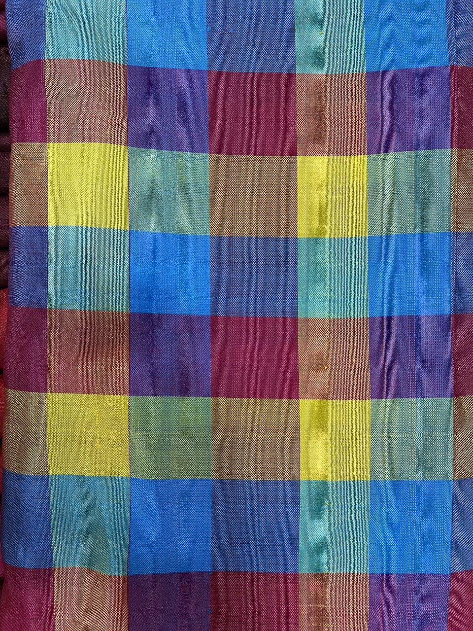Colourful Madras checks cotton fabric: an example of classic textile pattern styles. Photo by Shweta Venkateswaran, CC0 1.0.