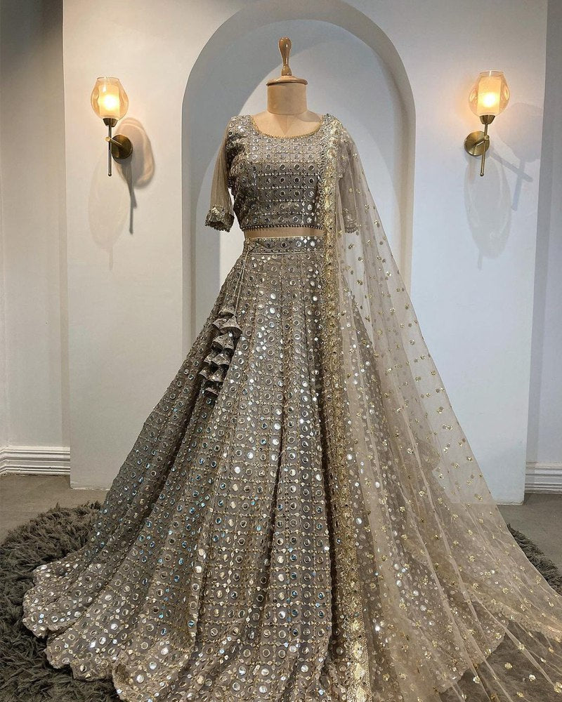 Grey paper mirror and jari work lehenga choli illustrating Navratri 2026 mirror-work styling