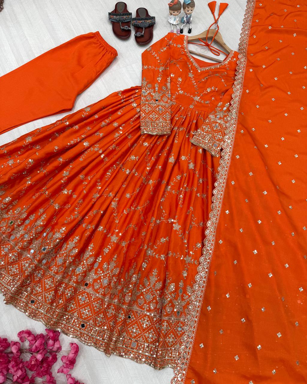 Orange Chinon Anarkali set illustrating lining, inner construction and flare support