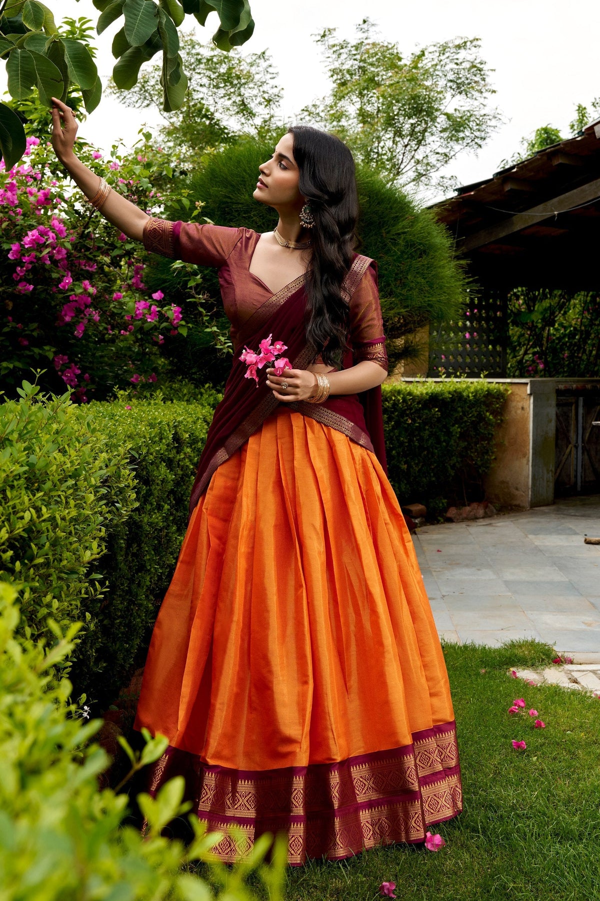 Orange Traditional Silk Lehenga Choli festive style from ClothsVilla