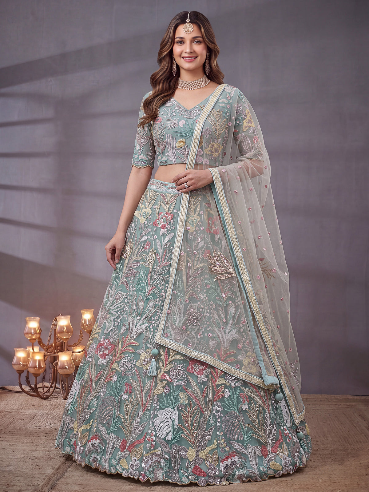 Sky blue soft net lehenga choli with thread and sequin embroidery