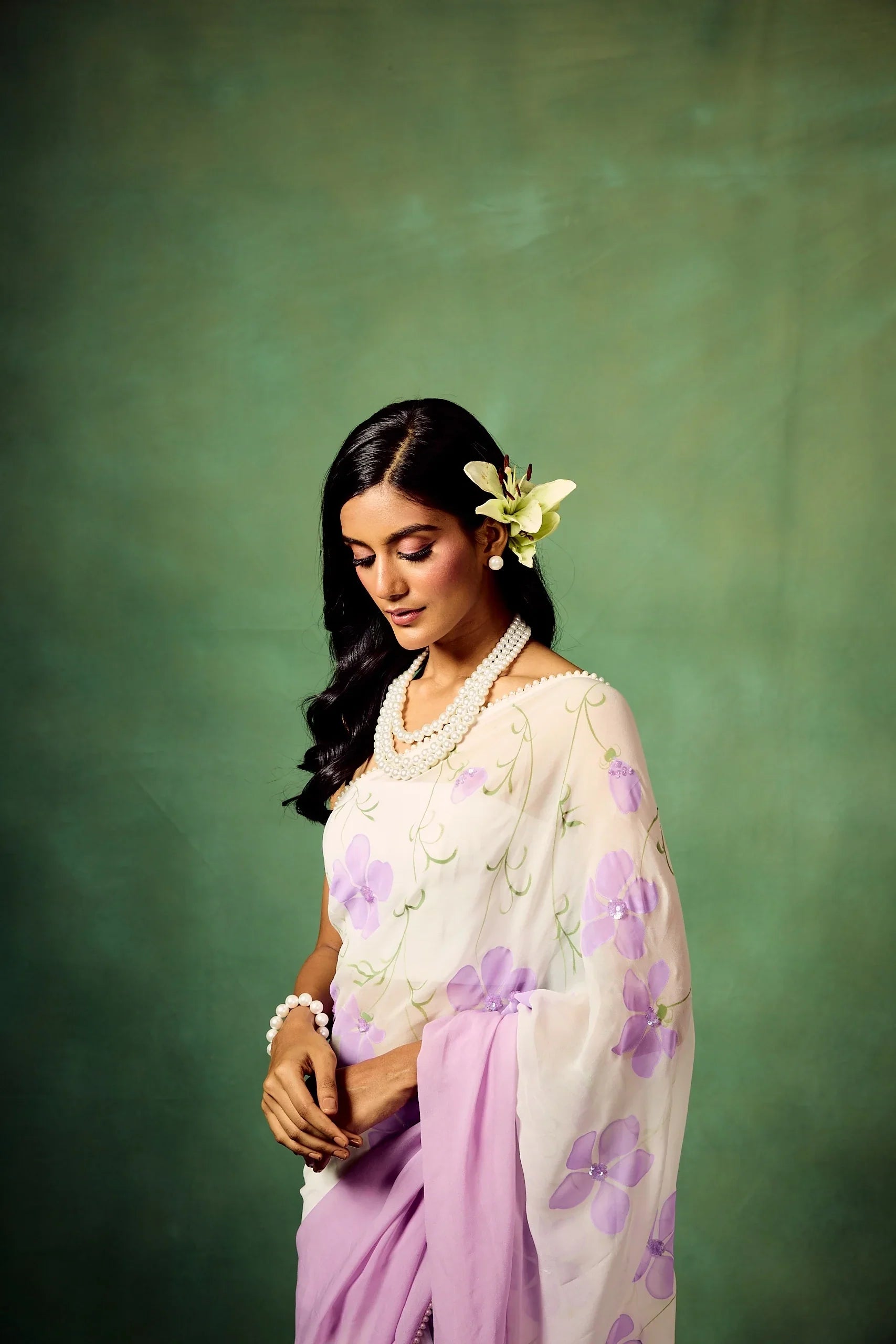 Lavender Bloom Pure Georgette Saree – Hand-Painted Floral Motifs with Sequins & Modal Satin Blouse FANCY SAREES