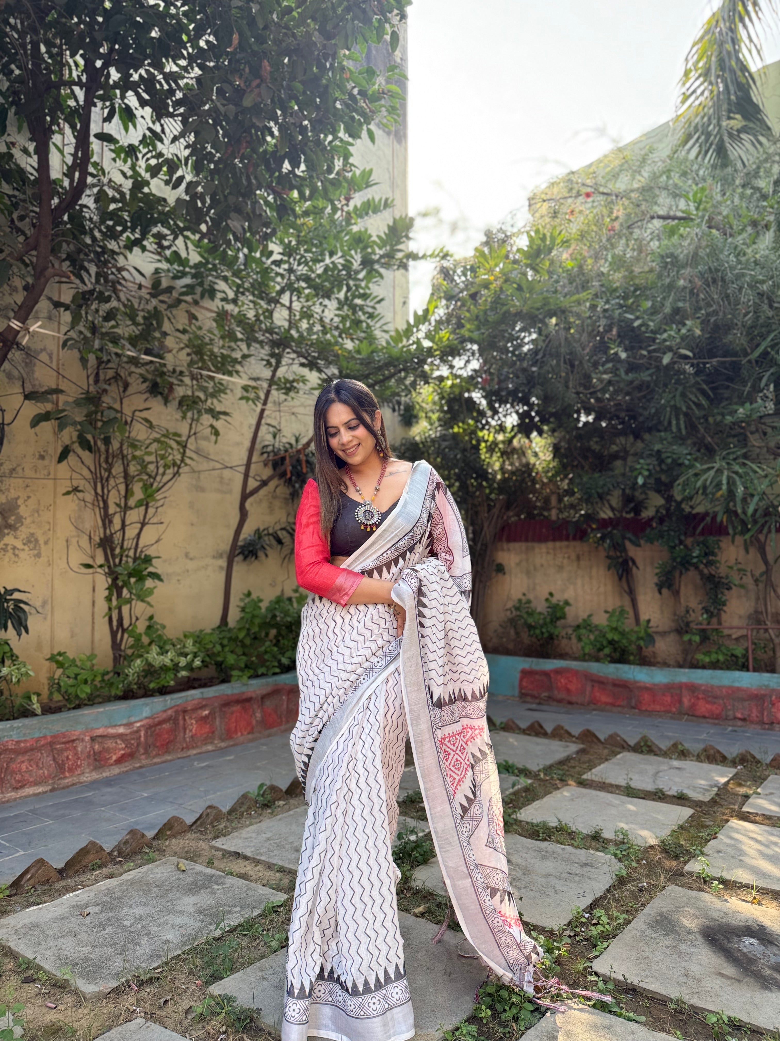 Elegant White Pure Linen Digital Printed Saree with Chevron Design and Intricate Red-Black Geometric Pallu – Tassel Details and Matching Blouse Piece Secondary image