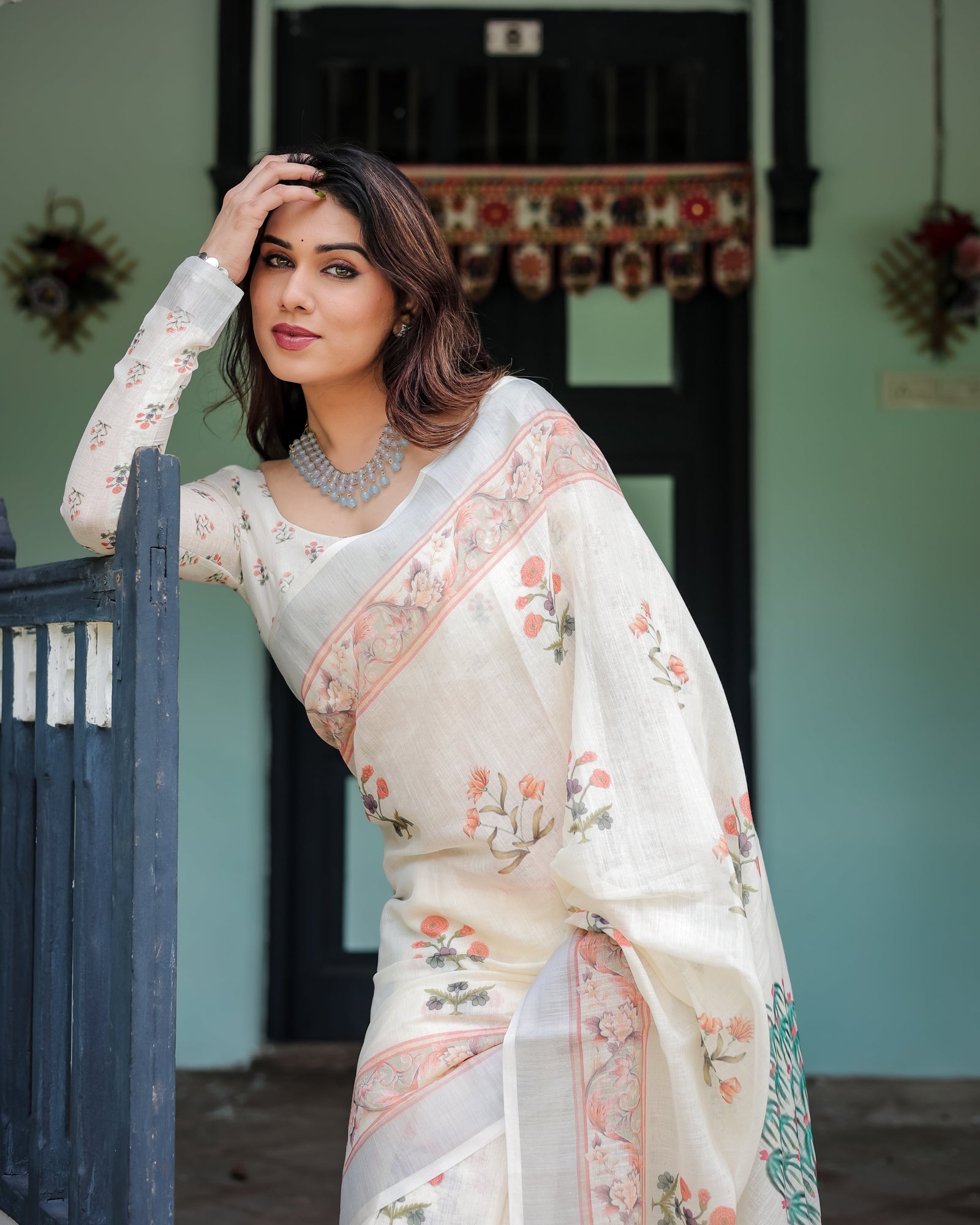 Ivory Pure Cotton Linen Saree with Pastel Floral Design, Blouse, and Tassel Detailing LINEN