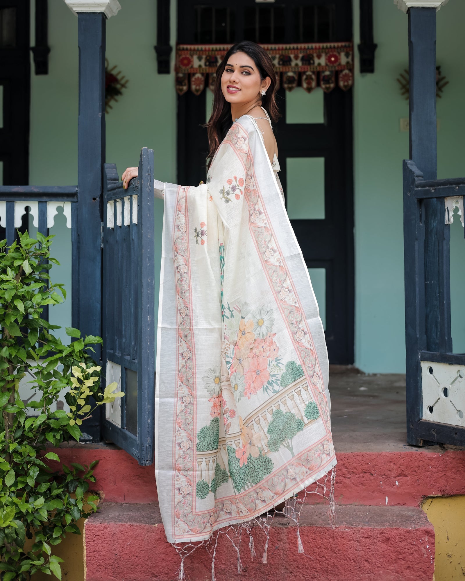 Ivory Pure Cotton Linen Saree with Pastel Floral Design, Blouse, and Tassel Detailing LINEN