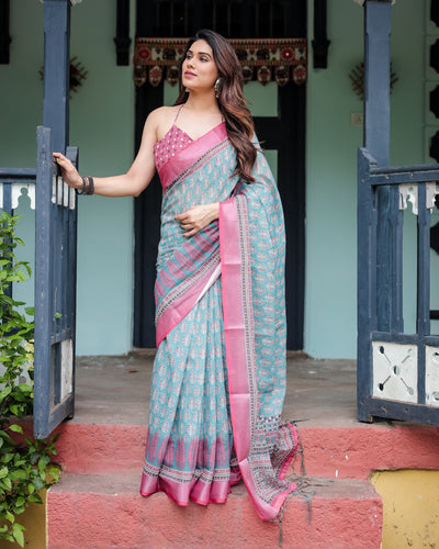 Aqua Blue Pure Cotton Linen Saree with Pink Border, Floral Motifs, and Tassel Detailing LINEN