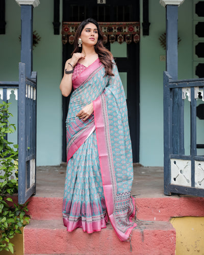 Aqua Blue Pure Cotton Linen Saree with Pink Border, Floral Motifs, and Tassel Detailing LINEN