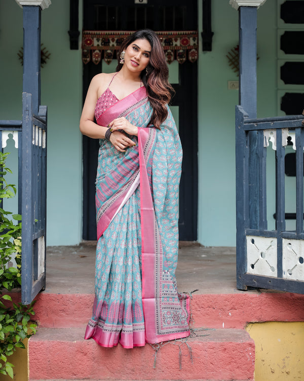 Aqua Blue Pure Cotton Linen Saree with Pink Border, Floral Motifs, and Tassel Detailing LINEN