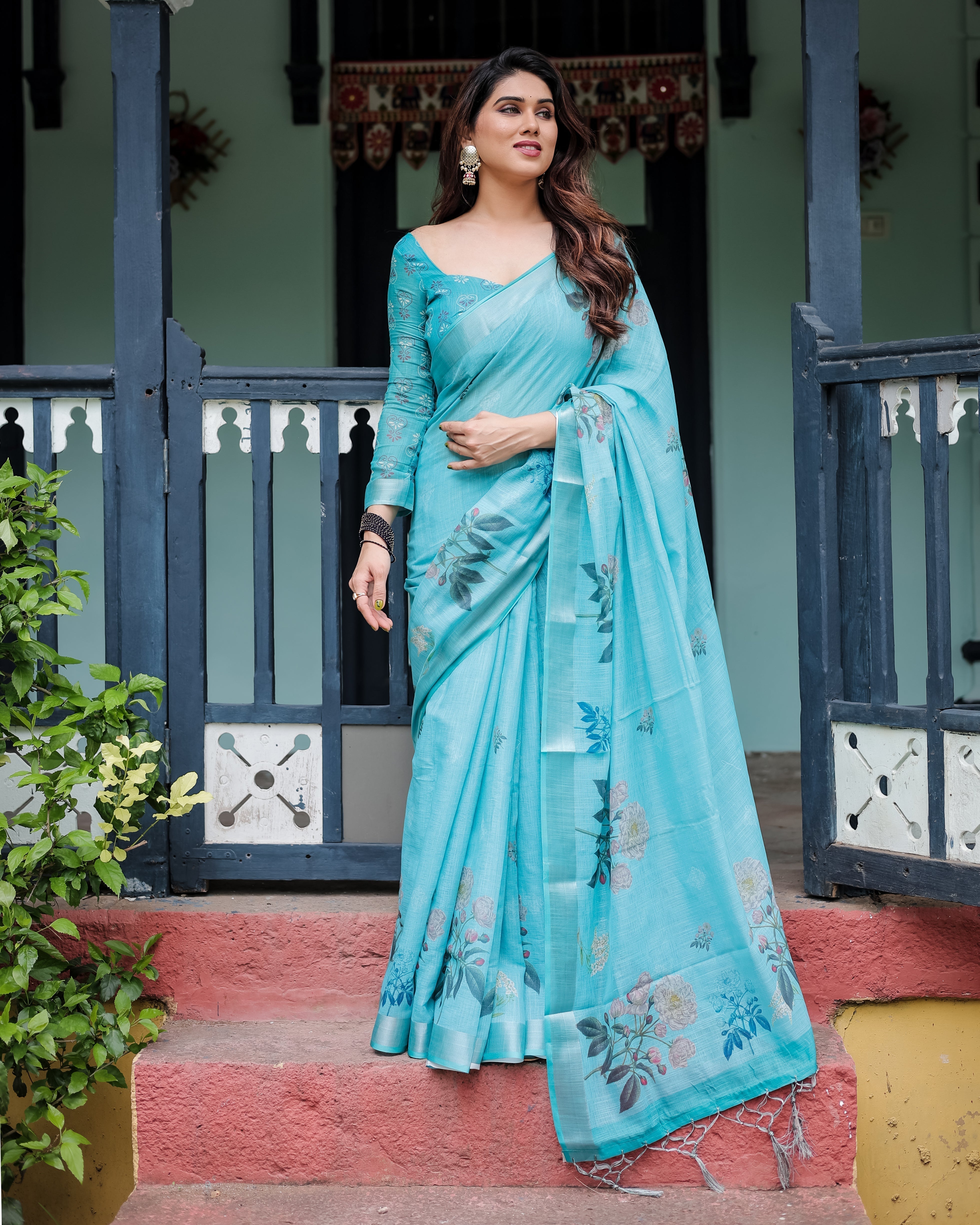 Aqua Blue Pure Cotton Linen Saree with Floral Design, Blouse, and Tassel Detailing LINEN Main image
