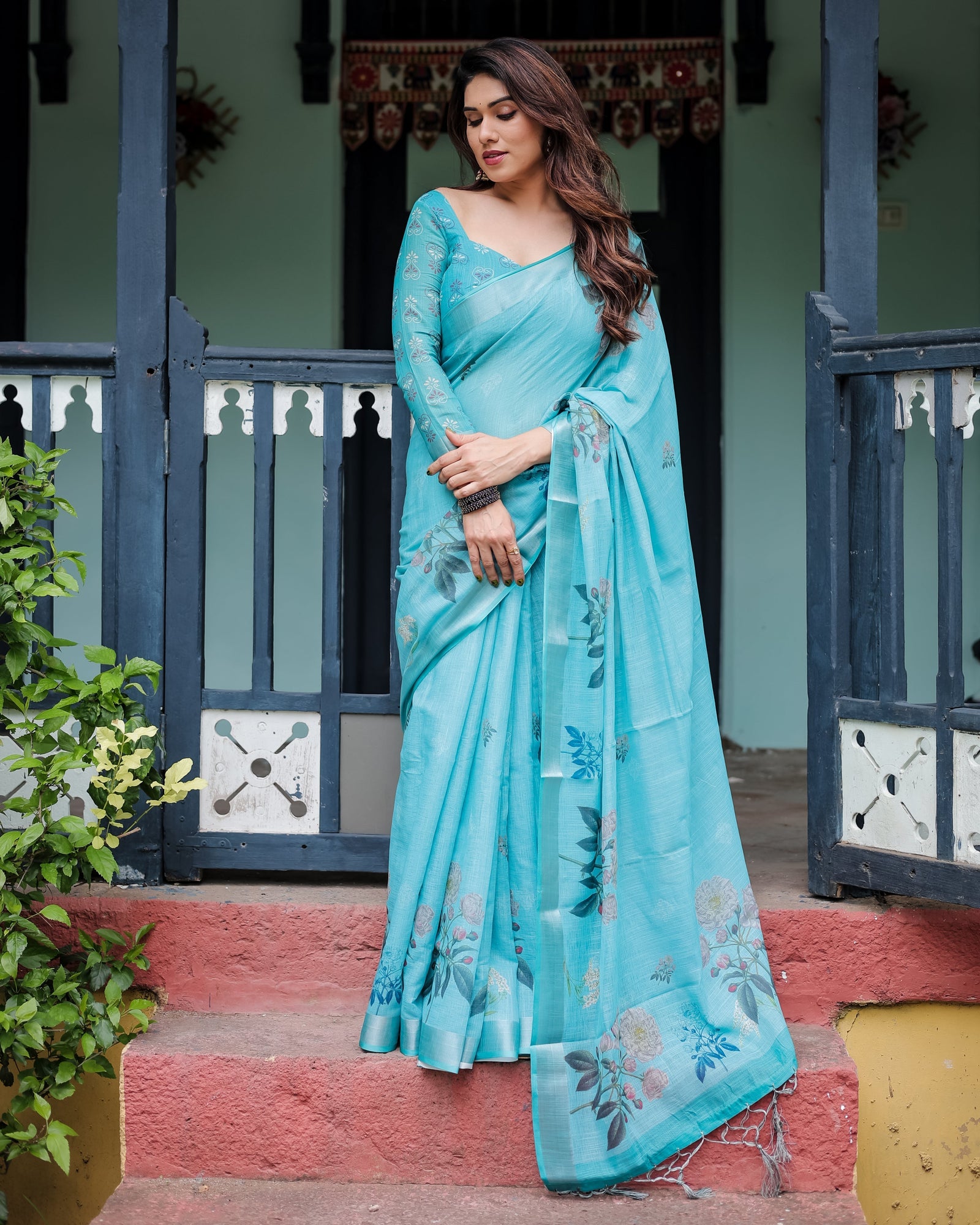 Aqua Blue Pure Cotton Linen Saree with Floral Design, Blouse, and Tassel Detailing LINEN