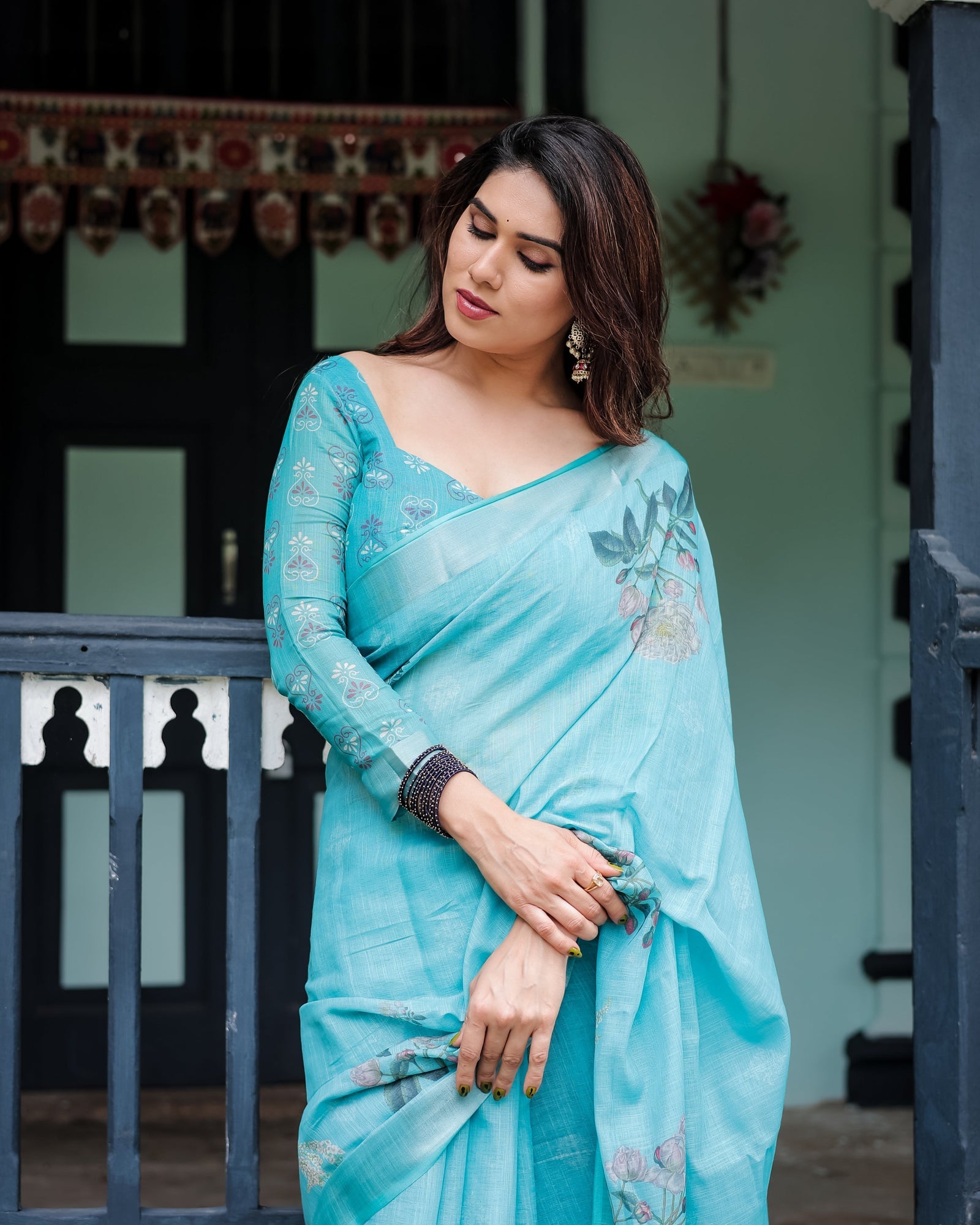 Aqua Blue Pure Cotton Linen Saree with Floral Design, Blouse, and Tassel Detailing LINEN