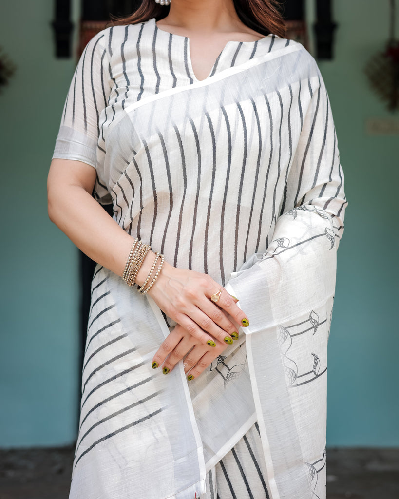 White and Black Pure Cotton Linen Saree with Striped Pattern, Blouse, and Tassel Detailing LINEN