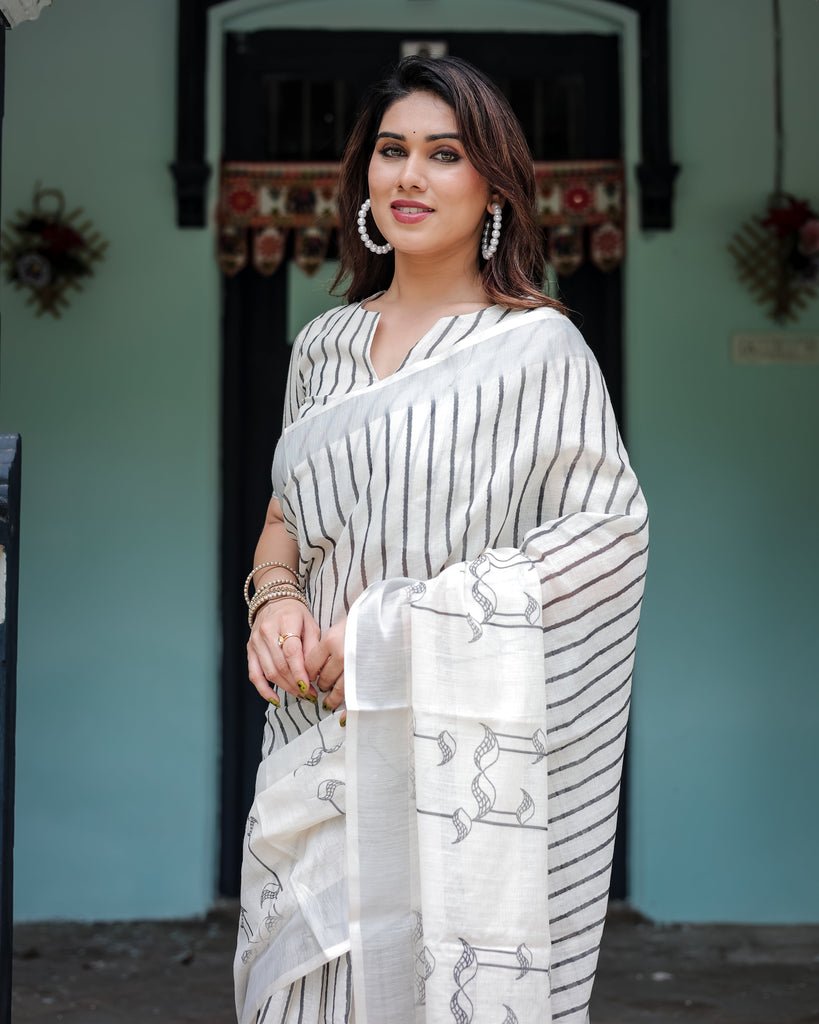 White and Black Pure Cotton Linen Saree with Striped Pattern, Blouse, and Tassel Detailing LINEN