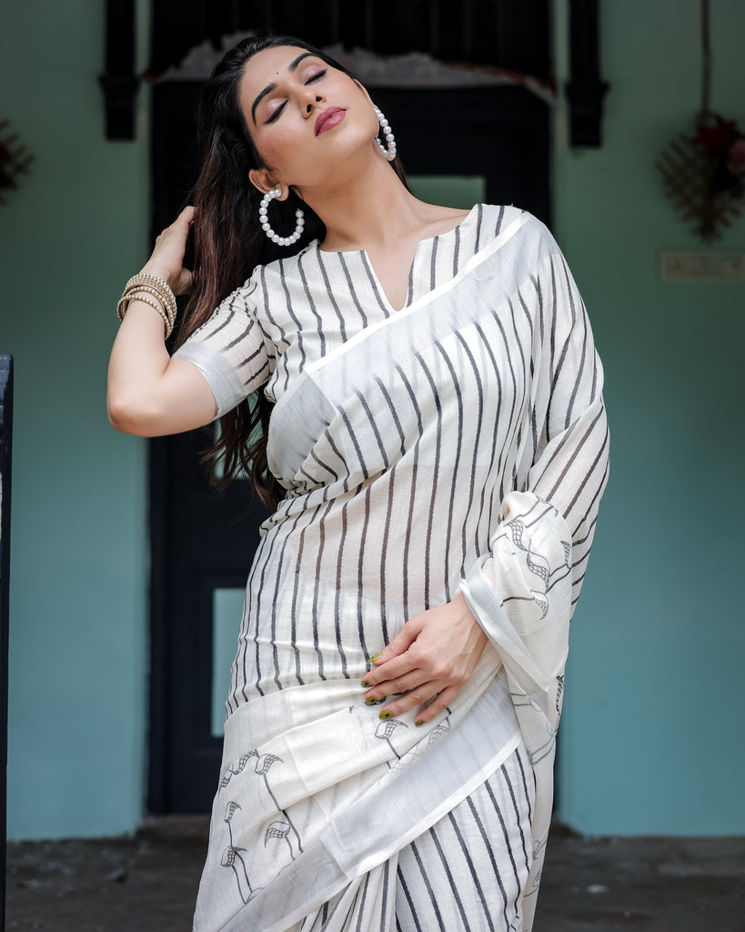 White and Black Pure Cotton Linen Saree with Striped Pattern, Blouse, and Tassel Detailing LINEN