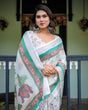 Load image into Gallery viewer, Ivory Pure Cotton Linen Saree with Elephant Motif and Floral Pattern, Green and Pink Borders, and Tassels on Edges. LINEN