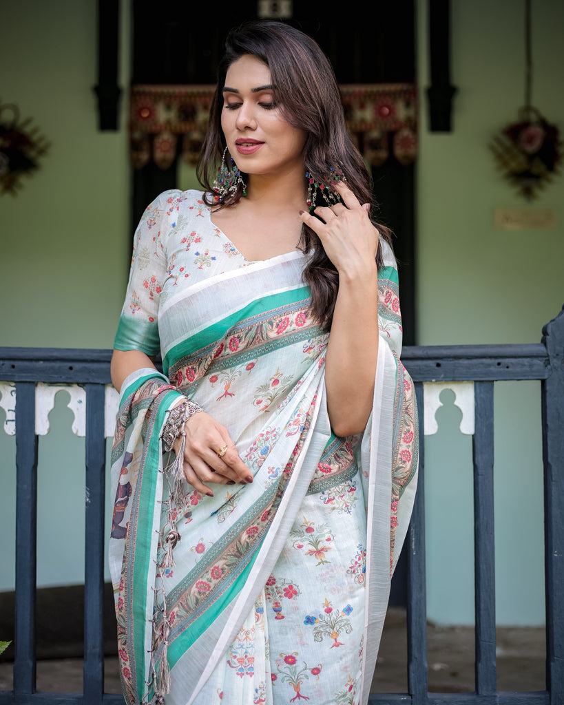 Ivory Pure Cotton Linen Saree with Elephant Motif and Floral Pattern, Green and Pink Borders, and Tassels on Edges. LINEN