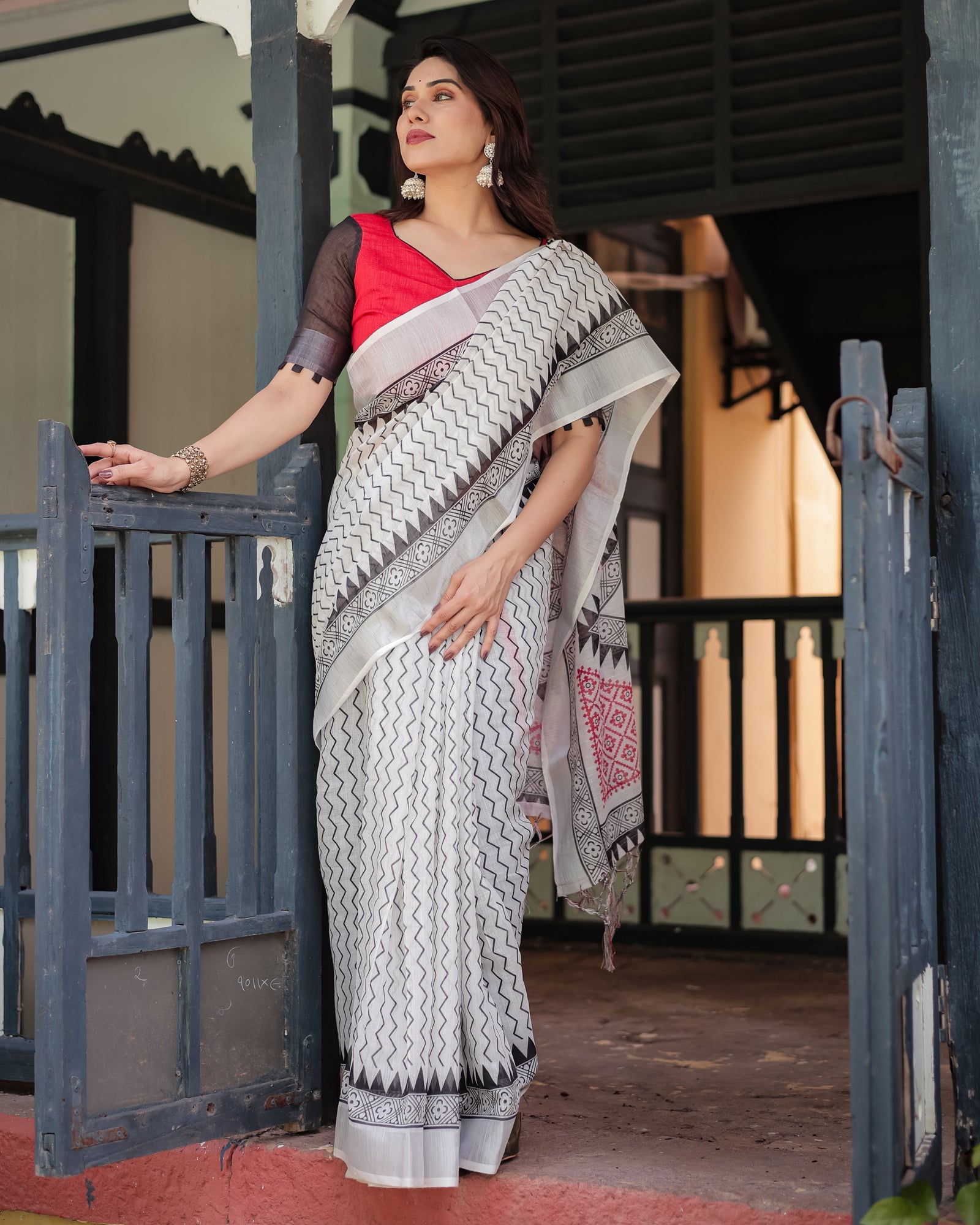 Black and White Geometric Pattern Pure Cotton Linen Saree with Red Accents, Blouse, and Tassel Details LINEN