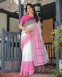 Load image into Gallery viewer, Elegant White and Pink Pure Cotton Linen Saree with Intricate Floral and Geometric Border Design and Tassels on Edges LINEN