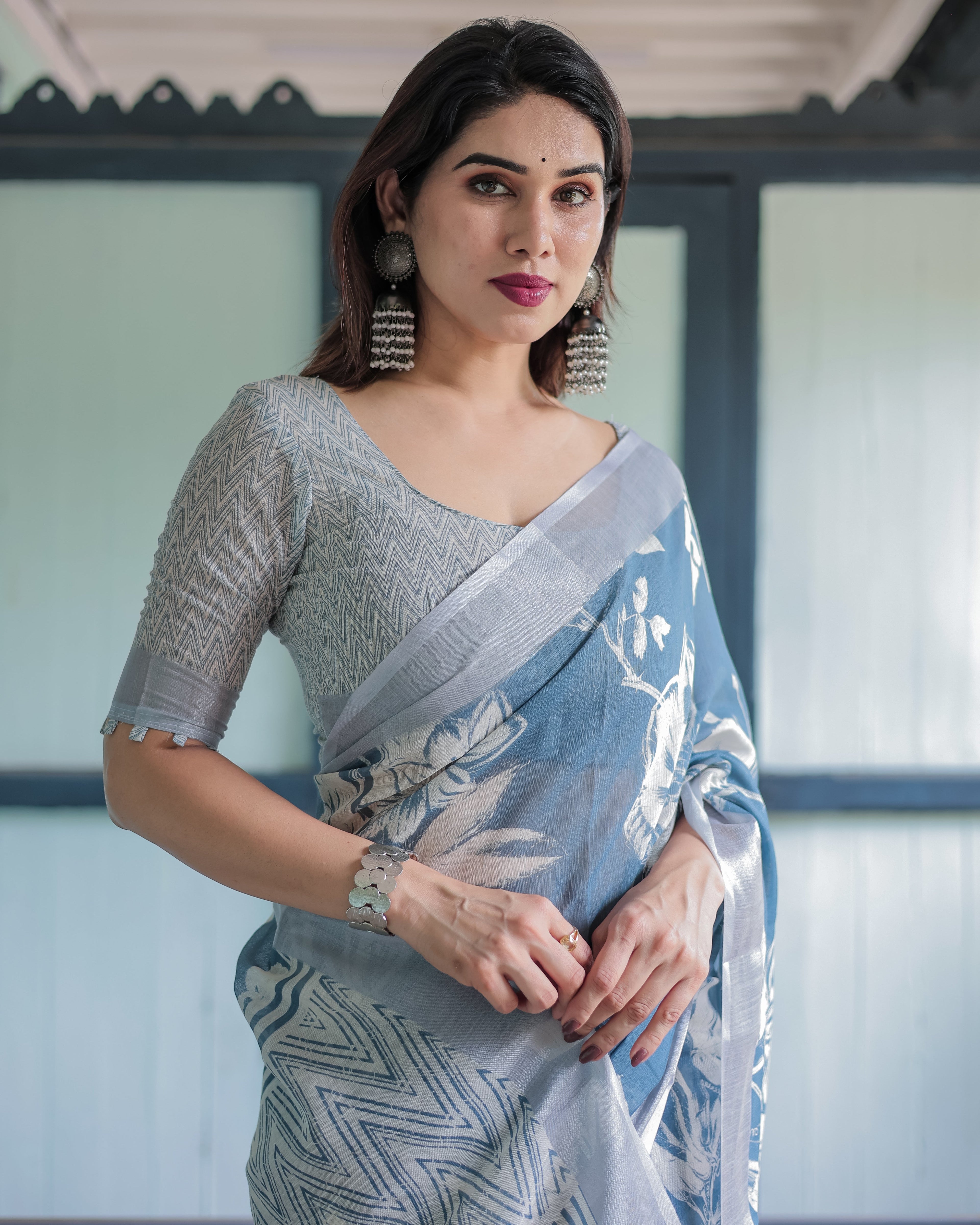 Pastel Blue Floral and Geometric Printed Cotton Linen Saree with Blouse and Tassel Edges LINEN