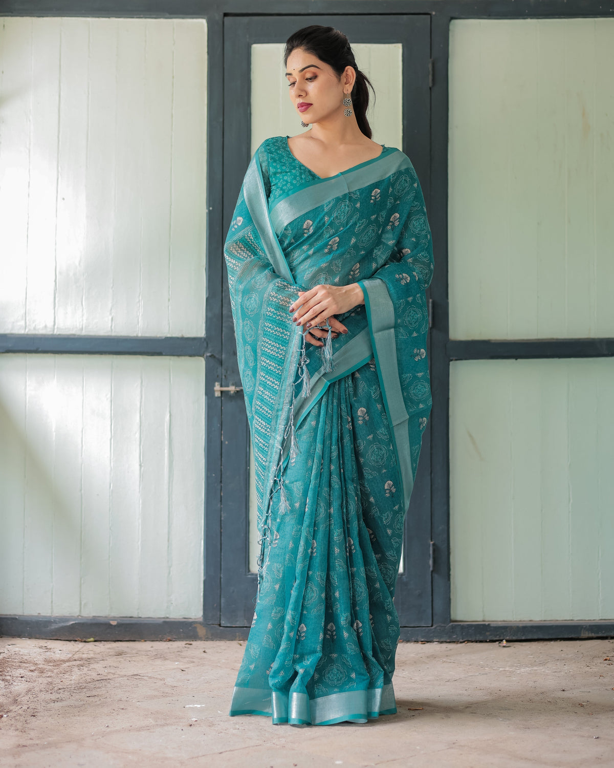 Teal Green Pure Cotton Linen Saree with Silver Floral Motifs and Tassels LINEN Main image