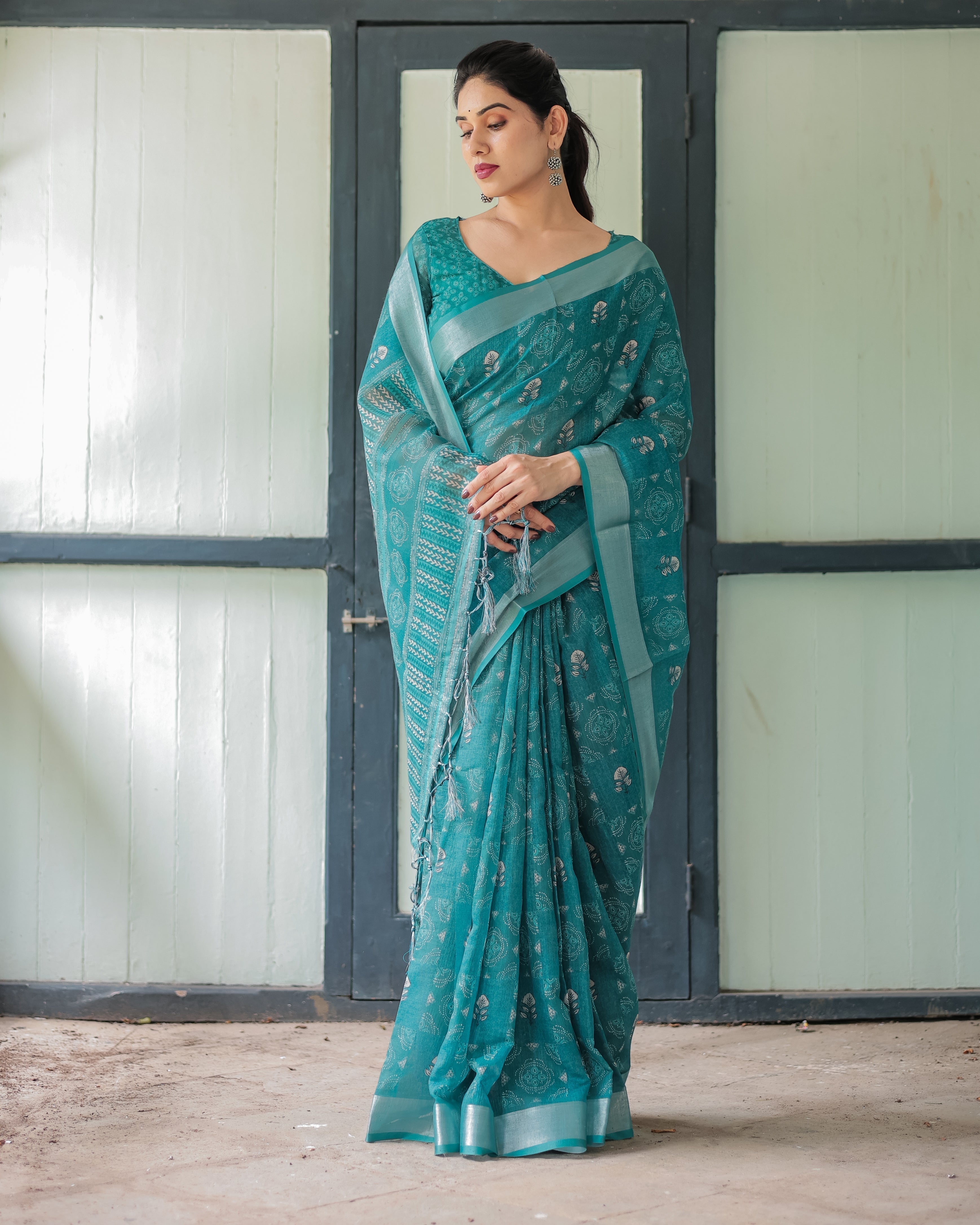Teal Green Pure Cotton Linen Saree with Silver Floral Motifs and Tassels LINEN Main image