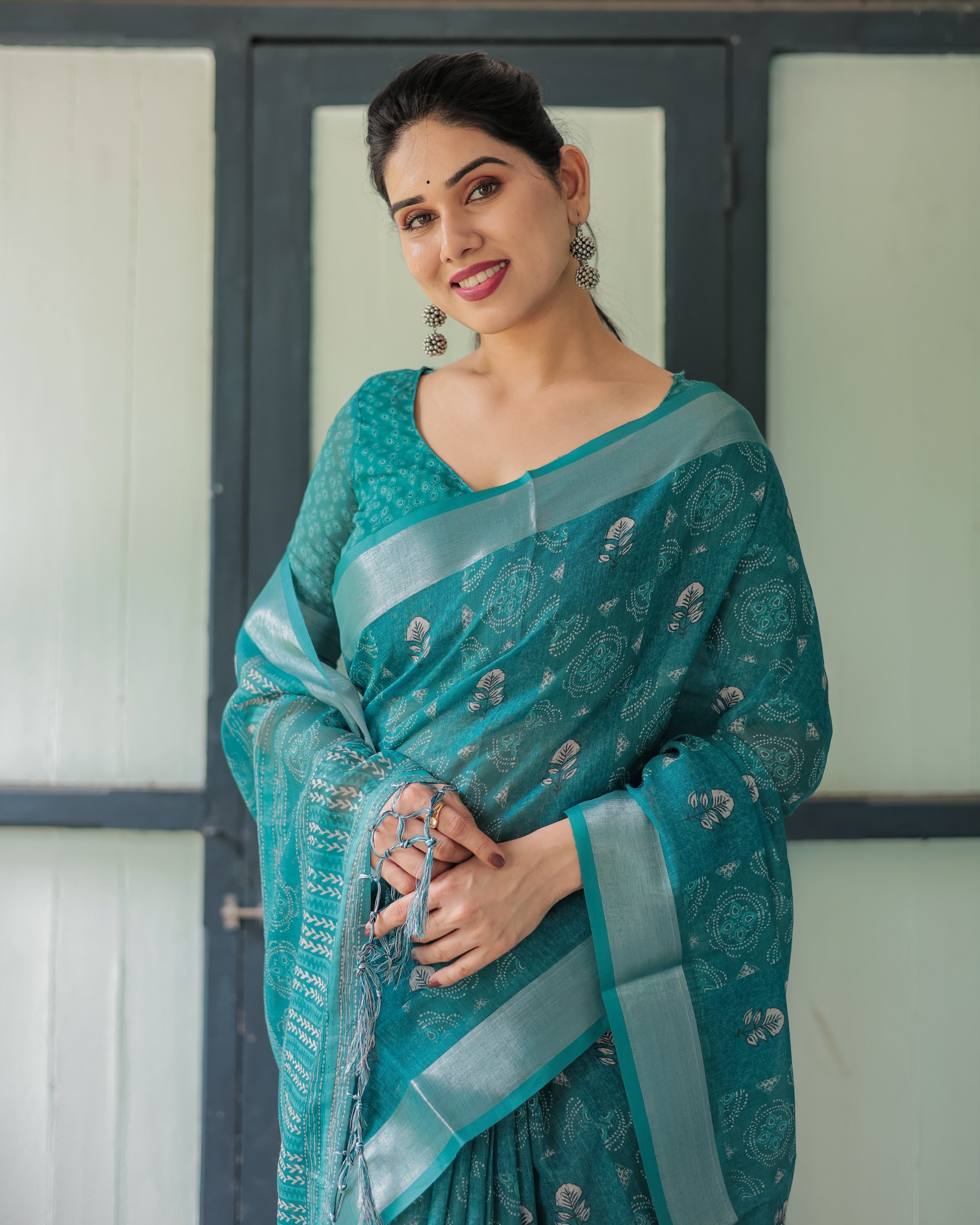 Teal Green Pure Cotton Linen Saree with Silver Floral Motifs and Tassels LINEN