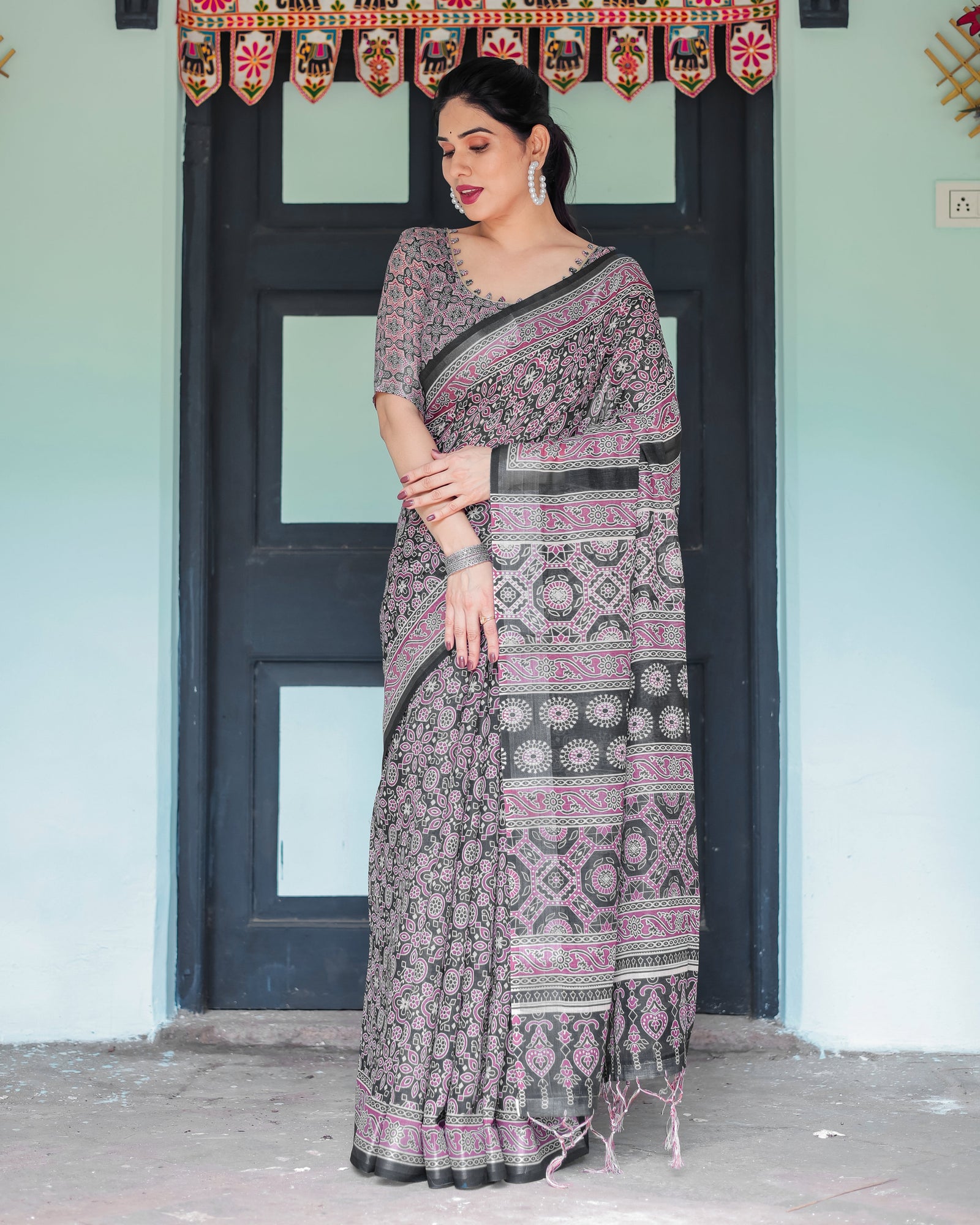 Black Pure Cotton Linen Saree with Pink Striped Pallu and Tassel Accents LINEN