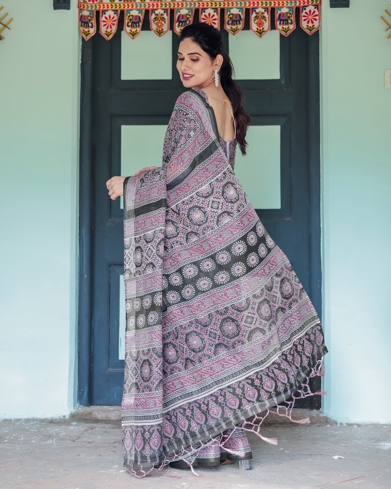 Black Pure Cotton Linen Saree with Pink Striped Pallu and Tassel Accents LINEN