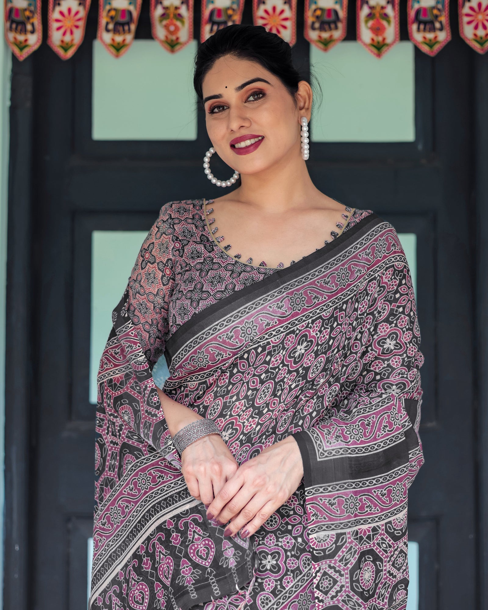 Black Pure Cotton Linen Saree with Pink Striped Pallu and Tassel Accents LINEN