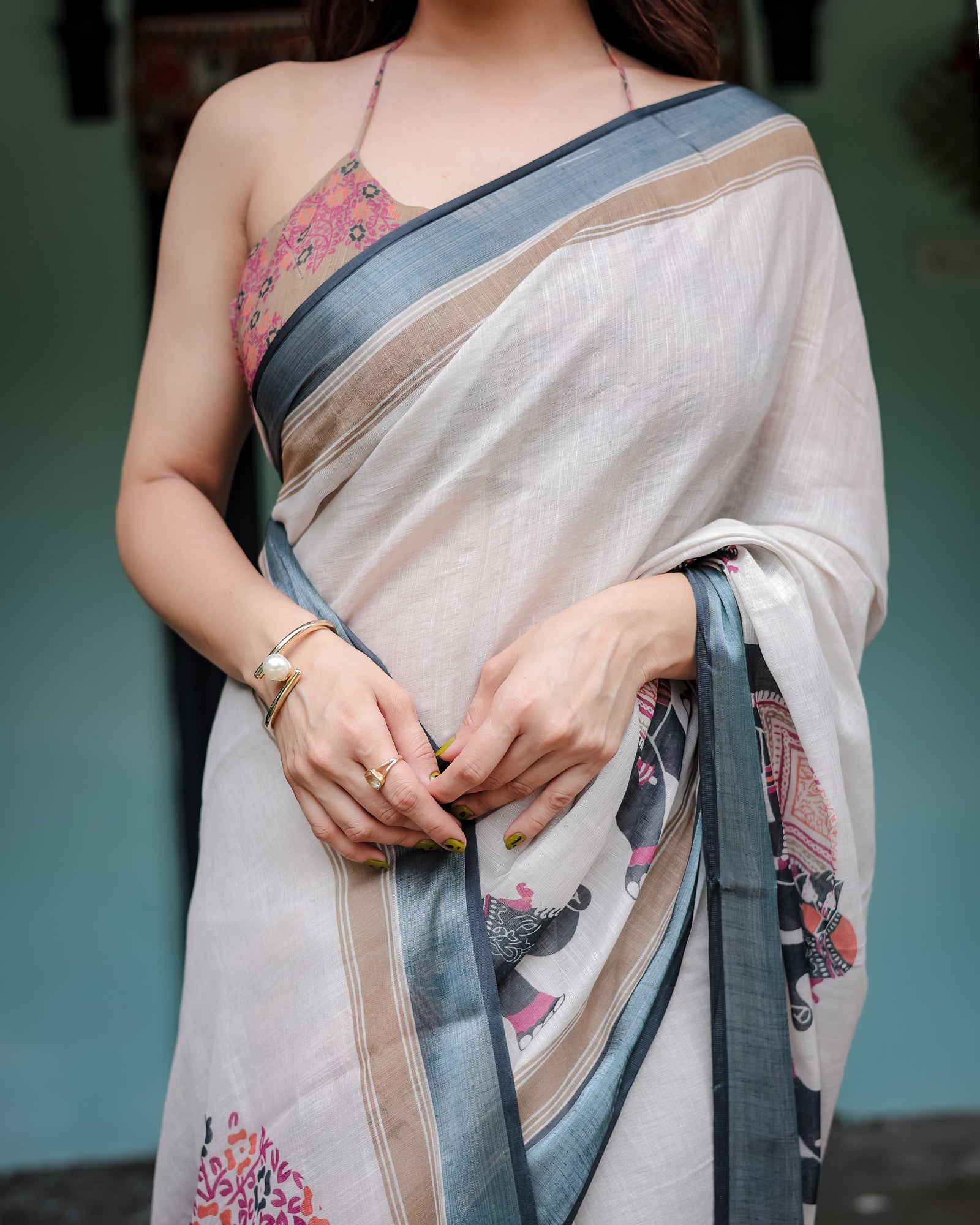 Ivory Pure Cotton Linen Saree with Elephant Motif and Tassel Detailing LINEN