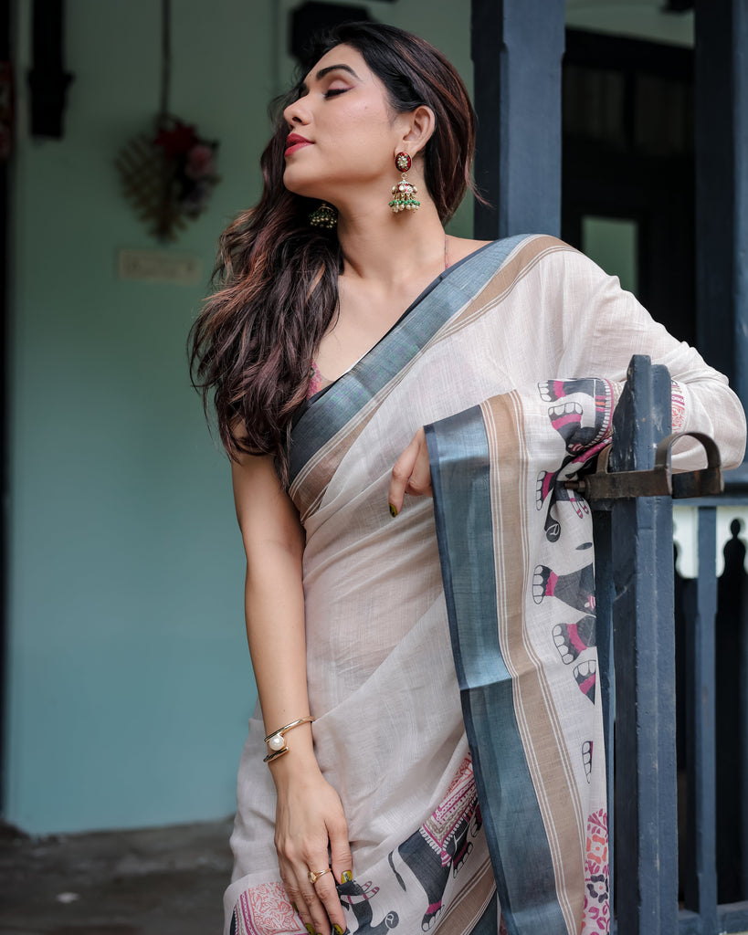 Ivory Pure Cotton Linen Saree with Elephant Motif and Tassel Detailing LINEN
