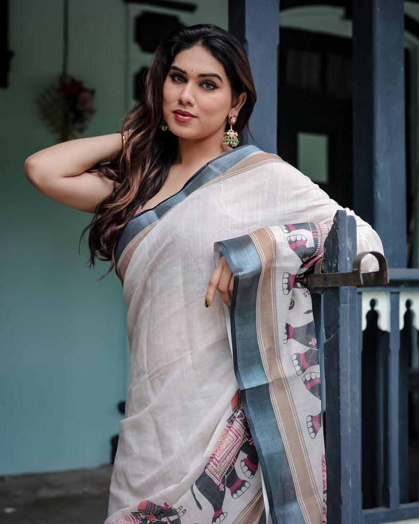 Ivory Pure Cotton Linen Saree with Elephant Motif and Tassel Detailing LINEN