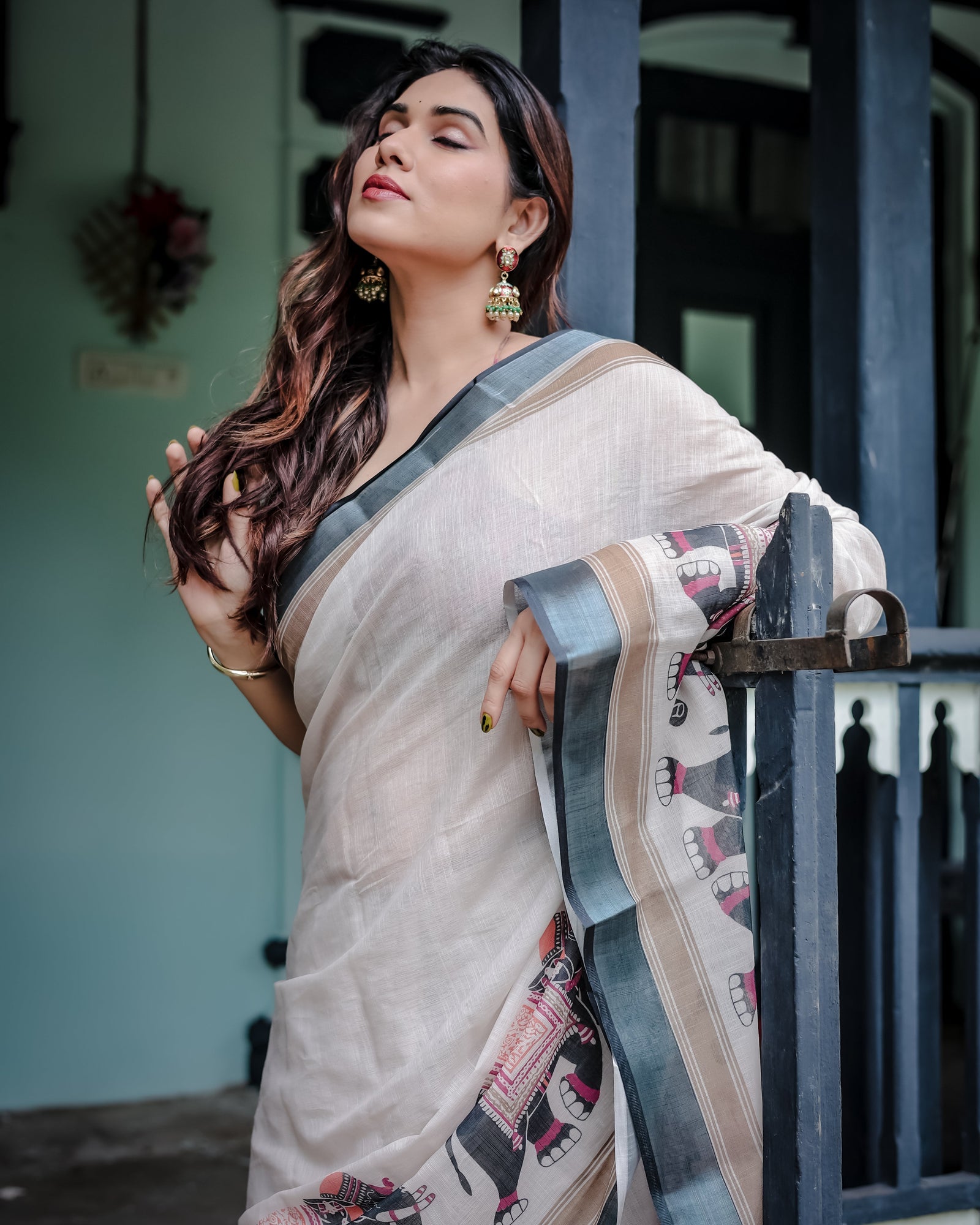 Ivory Pure Cotton Linen Saree with Elephant Motif and Tassel Detailing LINEN