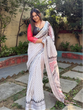Load image into Gallery viewer, Elegant White Pure Linen Digital Printed Saree with Chevron Design and Intricate Red-Black Geometric Pallu – Tassel Details and Matching Blouse Piece LINEN