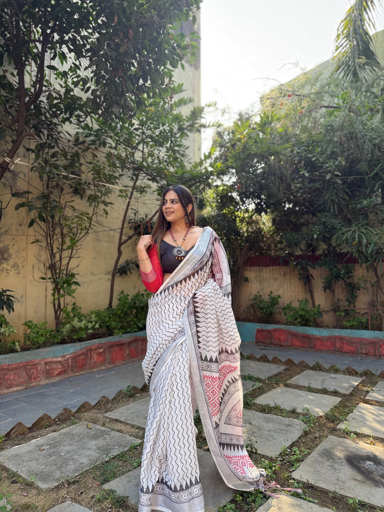 Elegant White Pure Linen Digital Printed Saree with Chevron Design and Intricate Red-Black Geometric Pallu – Tassel Details and Matching Blouse Piece LINEN