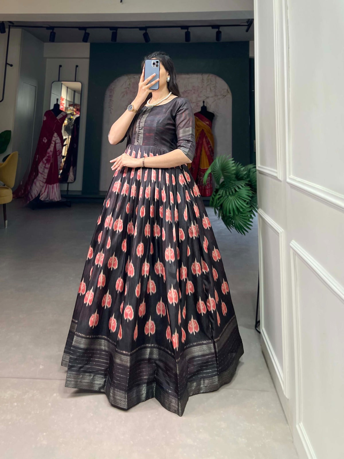Black Color Dola Silk Printed Gown with Exquisite Zari Border ClothsVilla