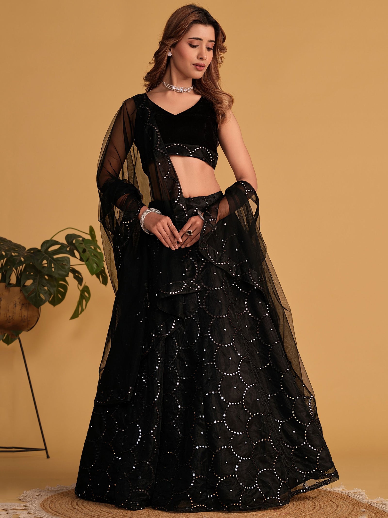Mesmerizing Black Mirror Work Organza Lehenga Choli Steal the Spotlight at Receptions and Events ClothsVilla