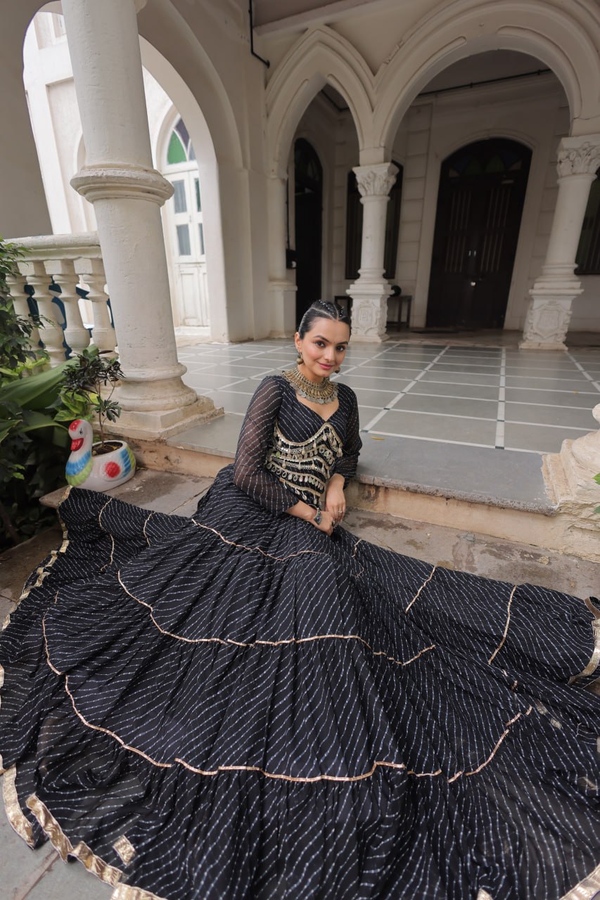 Black Navratri Special Leheriya Print Lehenga Choli with 12 Mtr Flair & Mirror Lace Work ClothsVilla